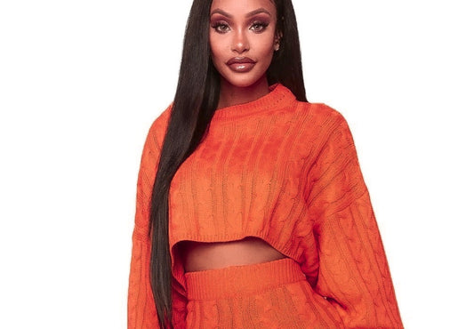 Front view of Cropped Long Sleeve Sweater in Hot Carrot with shorts