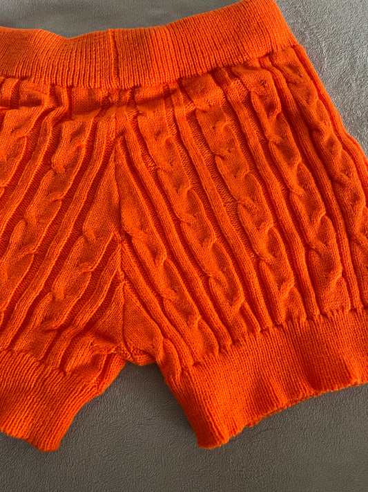Flat lay of Knit Shorts in Hot Carrot Orange color