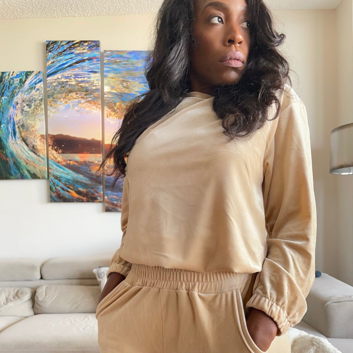 Model wearing Velvet Crew Neck Sweatshirt in Buttercream color
