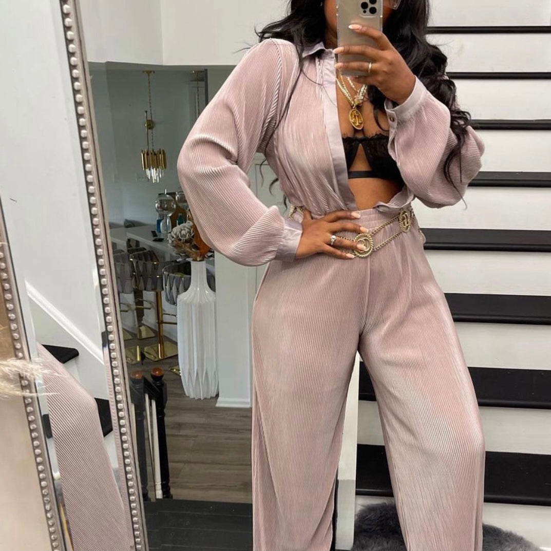 Model with long hair wearing Oversized Button Up Lounge Shirt in blush color lounge set