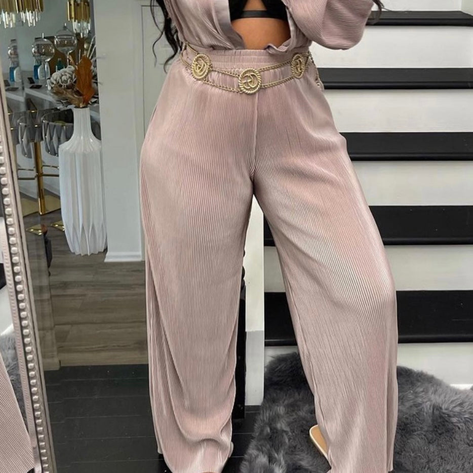 Model wears Pleated Flared Wide Leg Pants in champagne pink