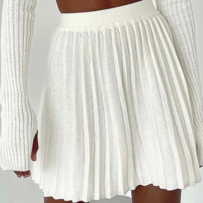 Model wearing Pleated White Knit and top set