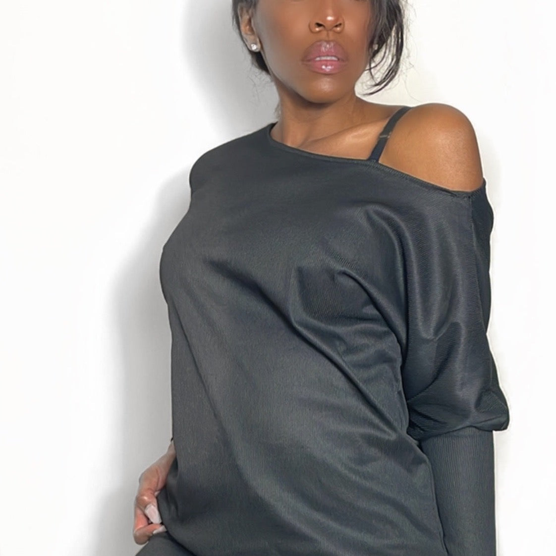 Model wearing Asymetrical Shoulder Top | Soire Ribbed Long Sleeve Top Black