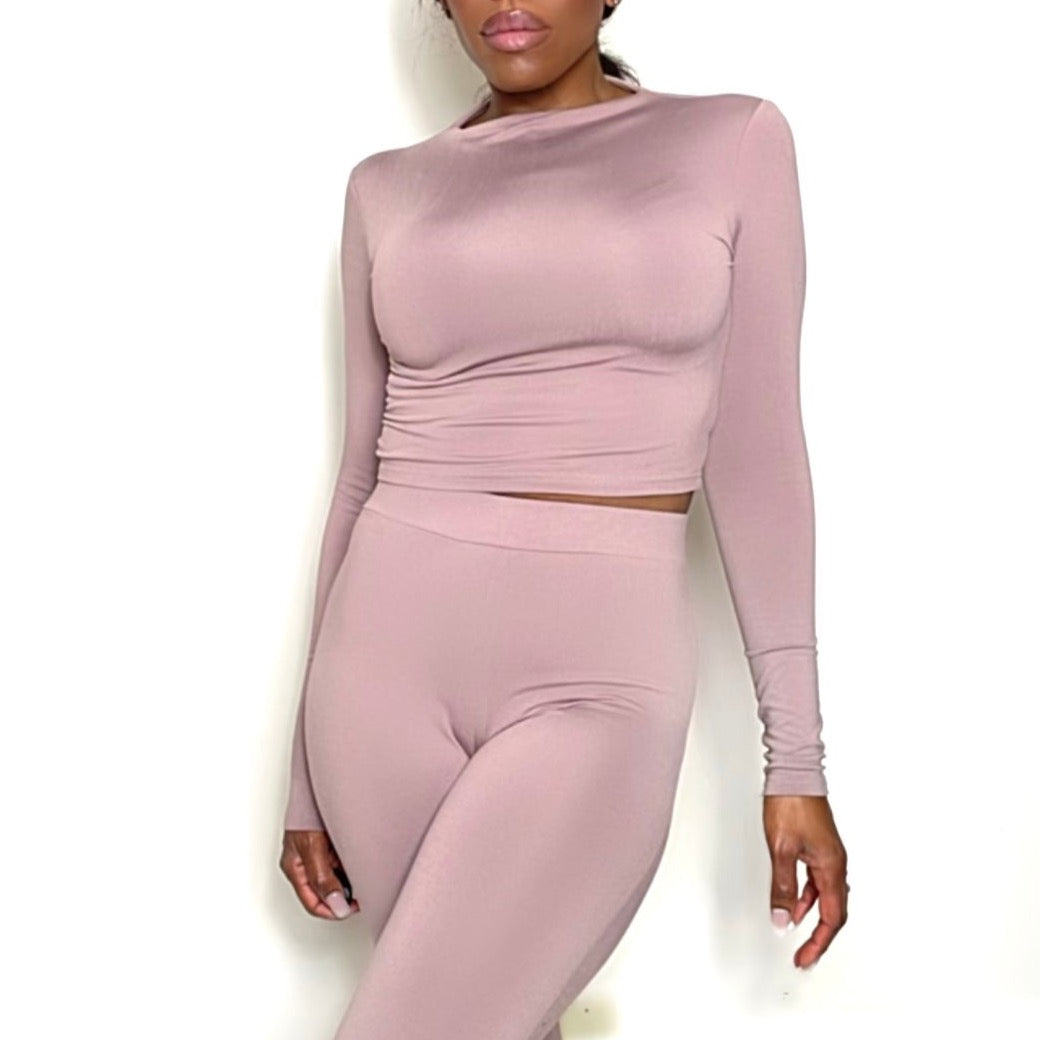 Model wearing Mock Neck Stretchy Long Sleeve Crop Top in blush